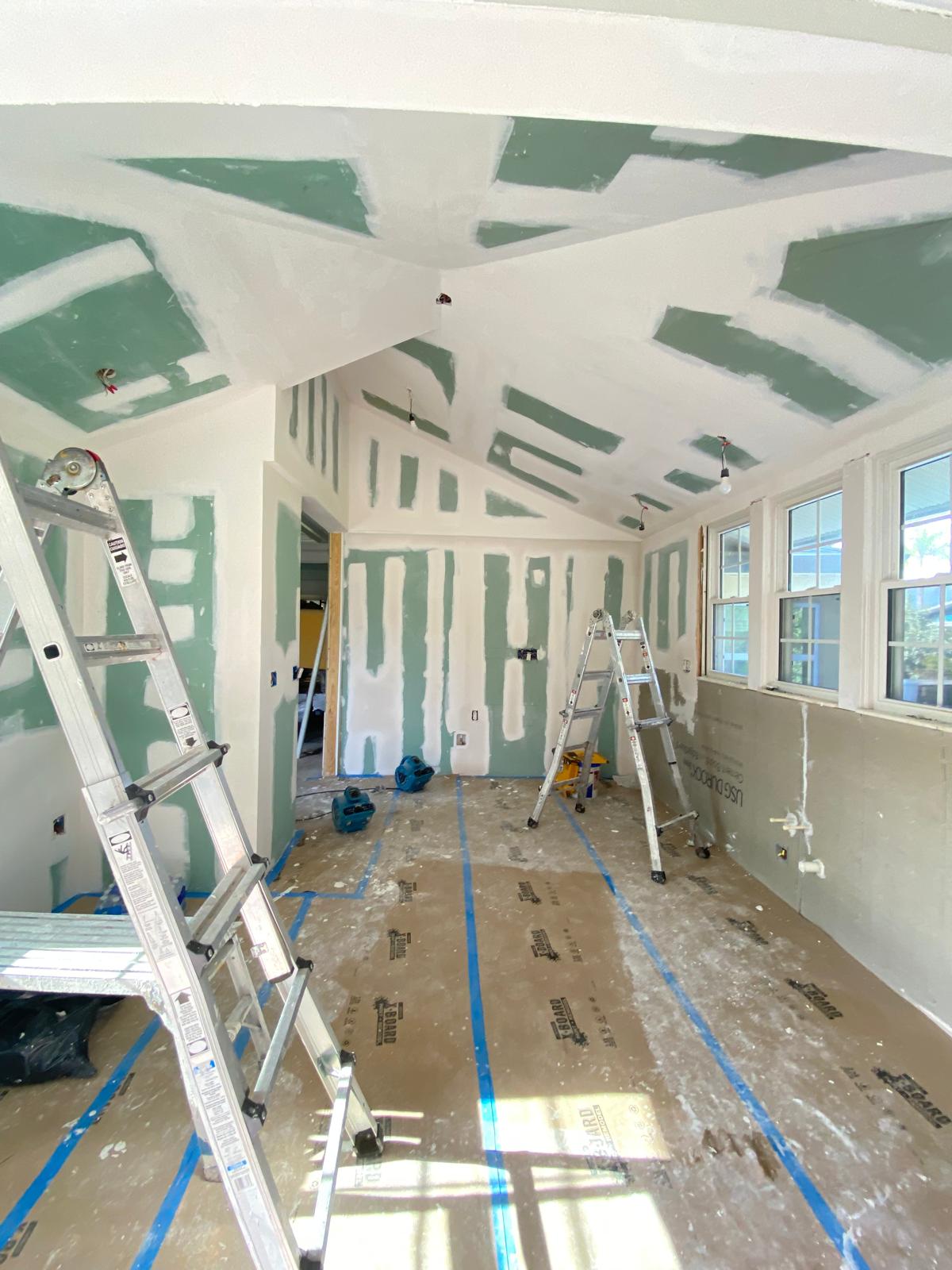 Professional drywall installation with vaulted ceiling