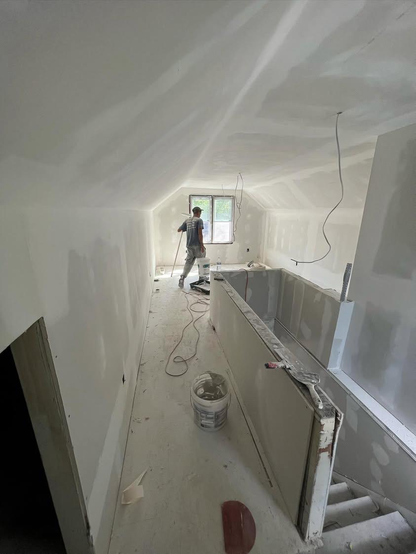 Attic conversion drywall installation
