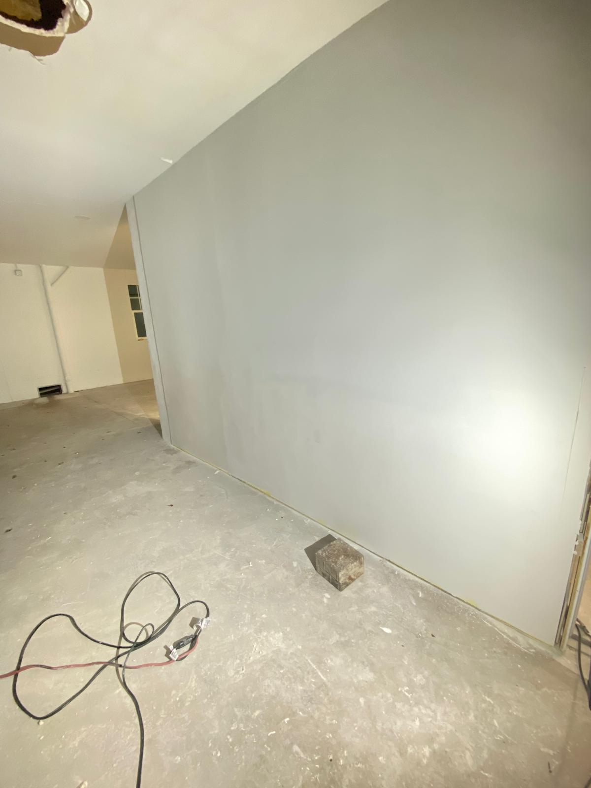 Garage with angled wall drywall