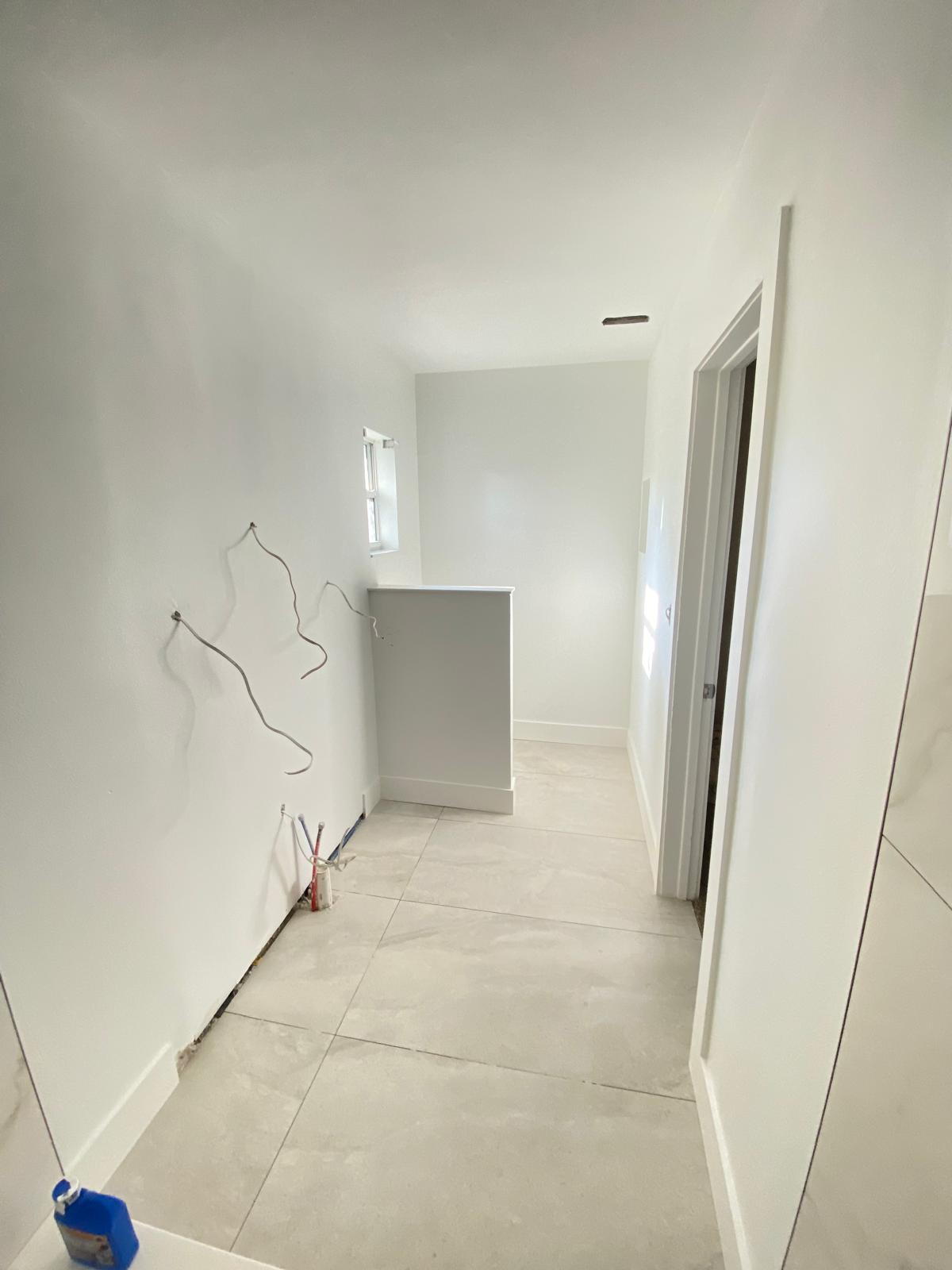Hallway white painting in progress