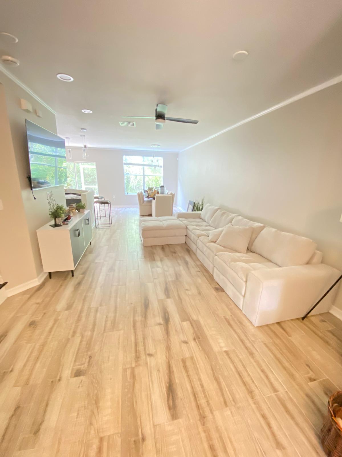 Professional living room painting with modern furniture