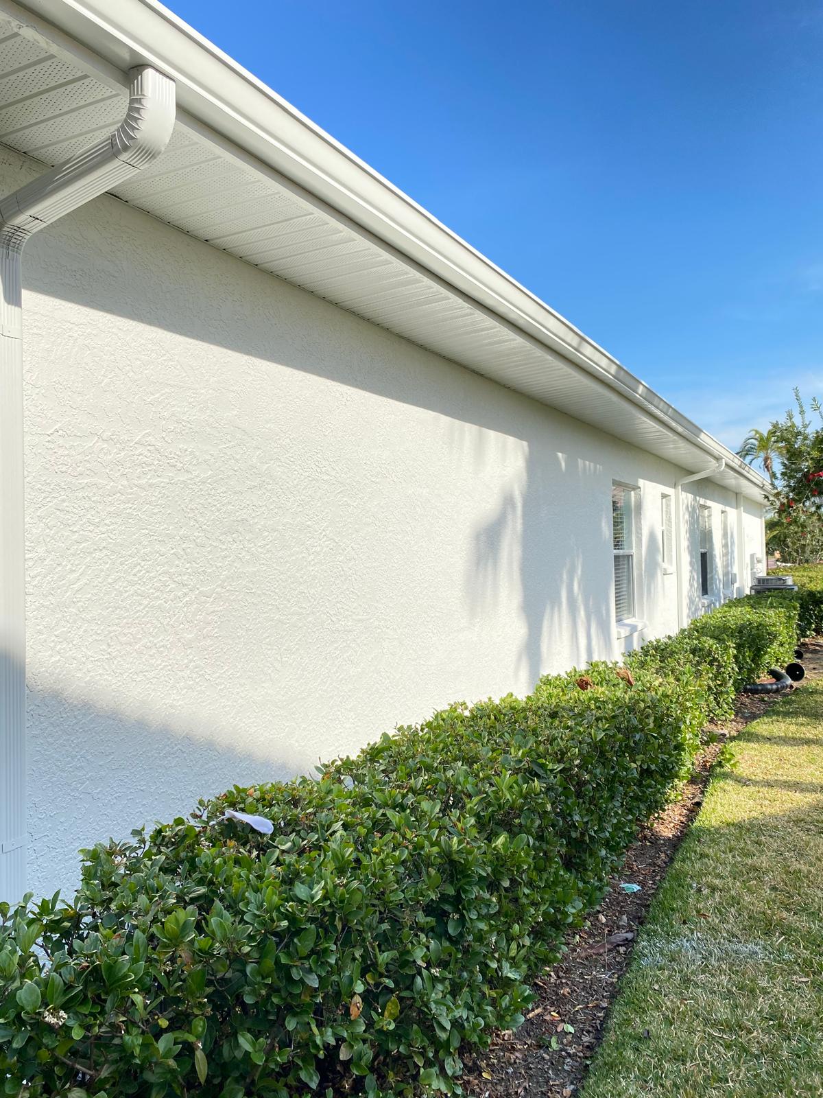 Exterior white stucco painting